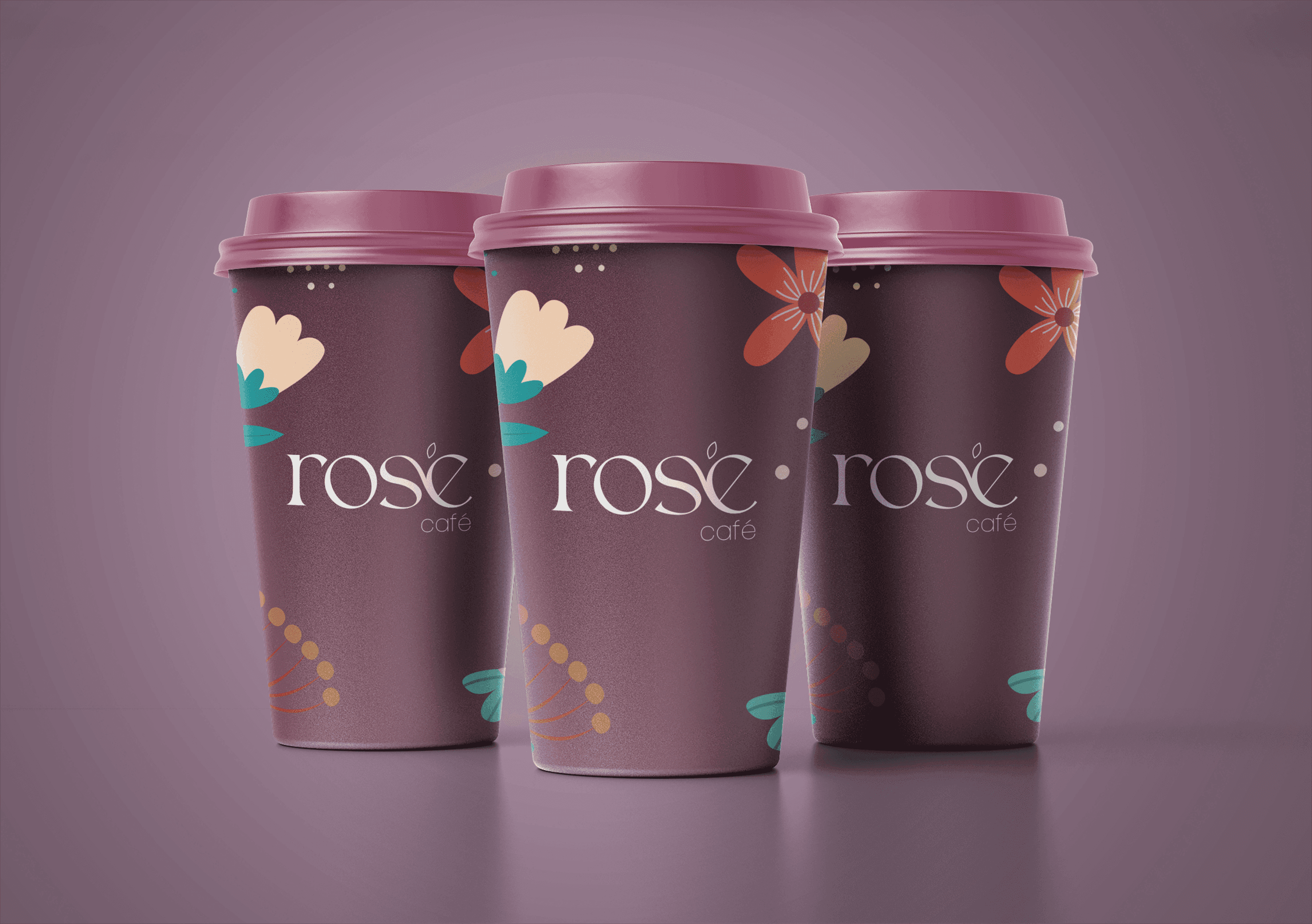 Rosé Café branded coffee cups with floral illustrations