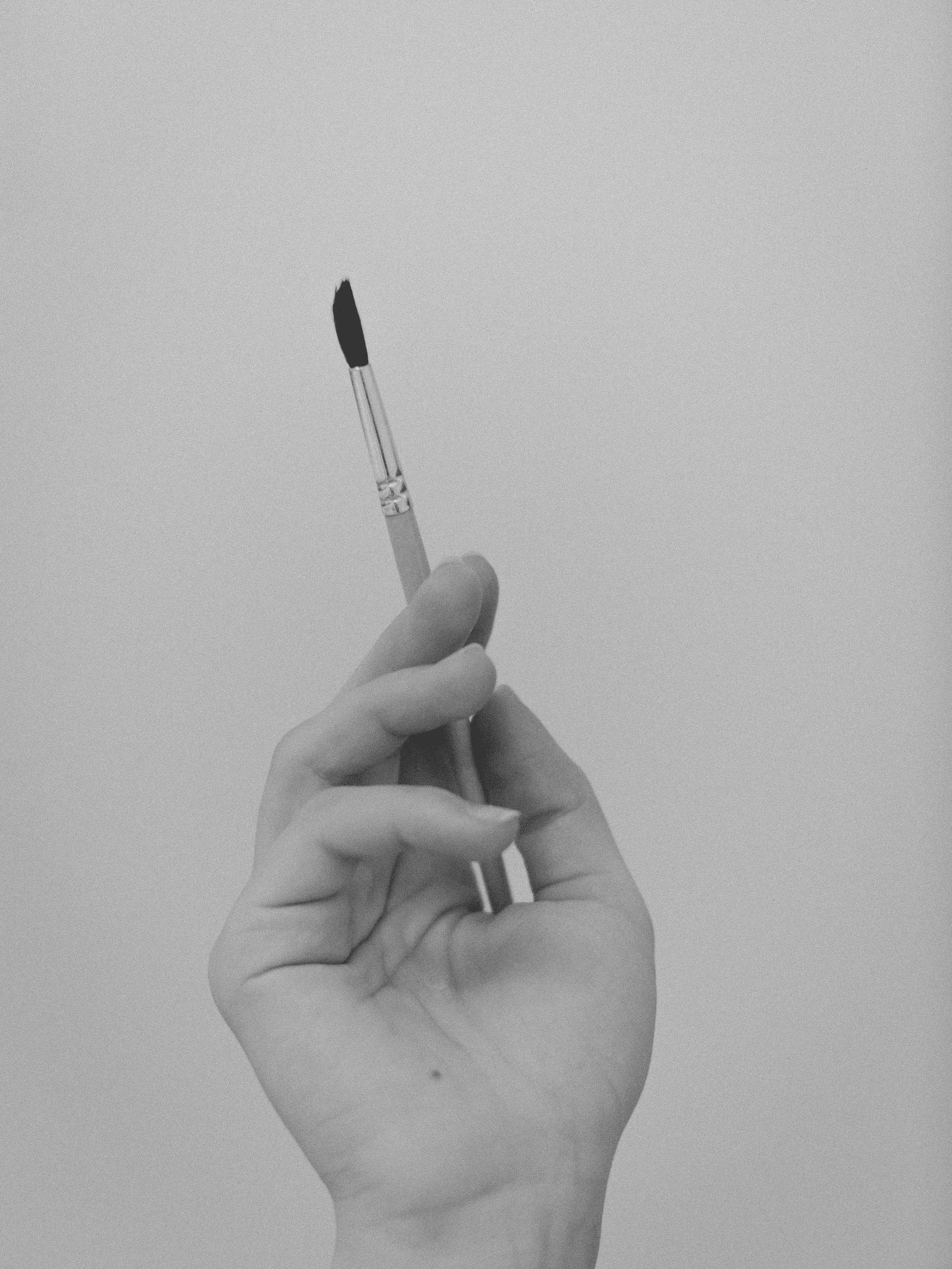 BĒBOHĀ - person holding black and white pen