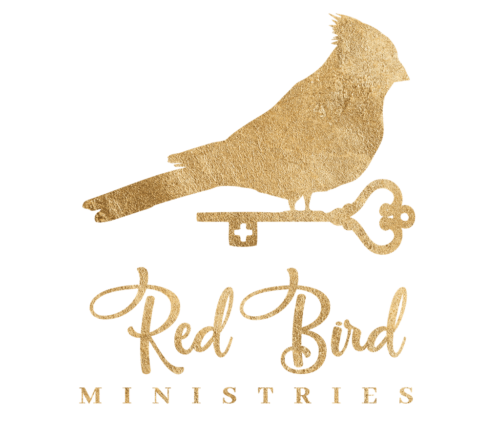 Gold bird silhouette on key with "Red Bird Ministries" text.