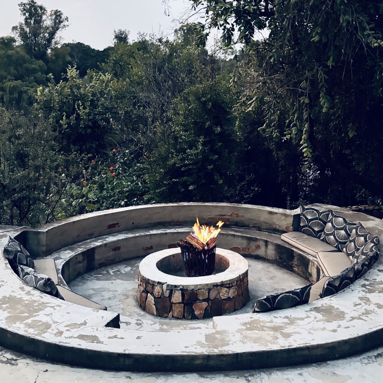 A calm outdoor fire pit lounge, symbolising a strong foundation