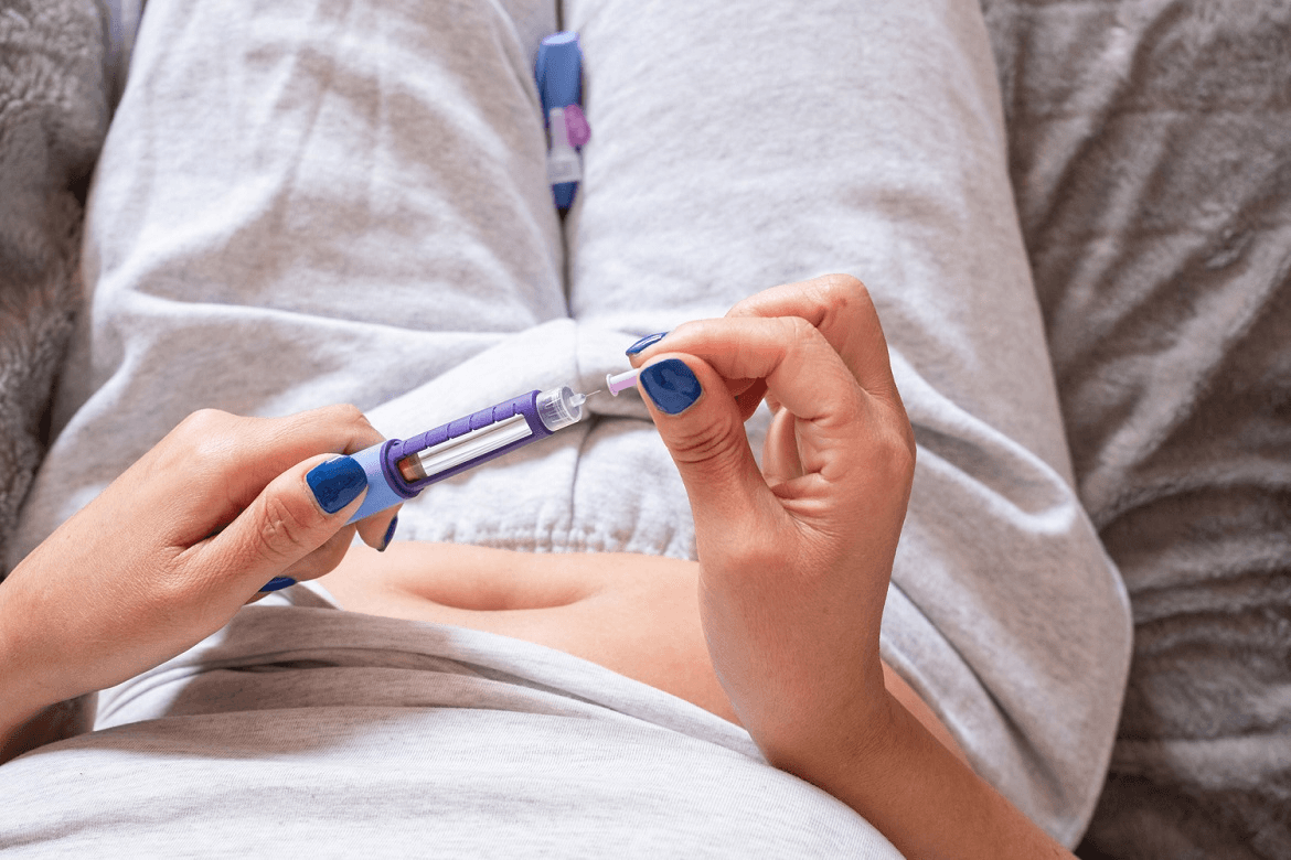 person using medication - GLP-1 Cost With Insurance