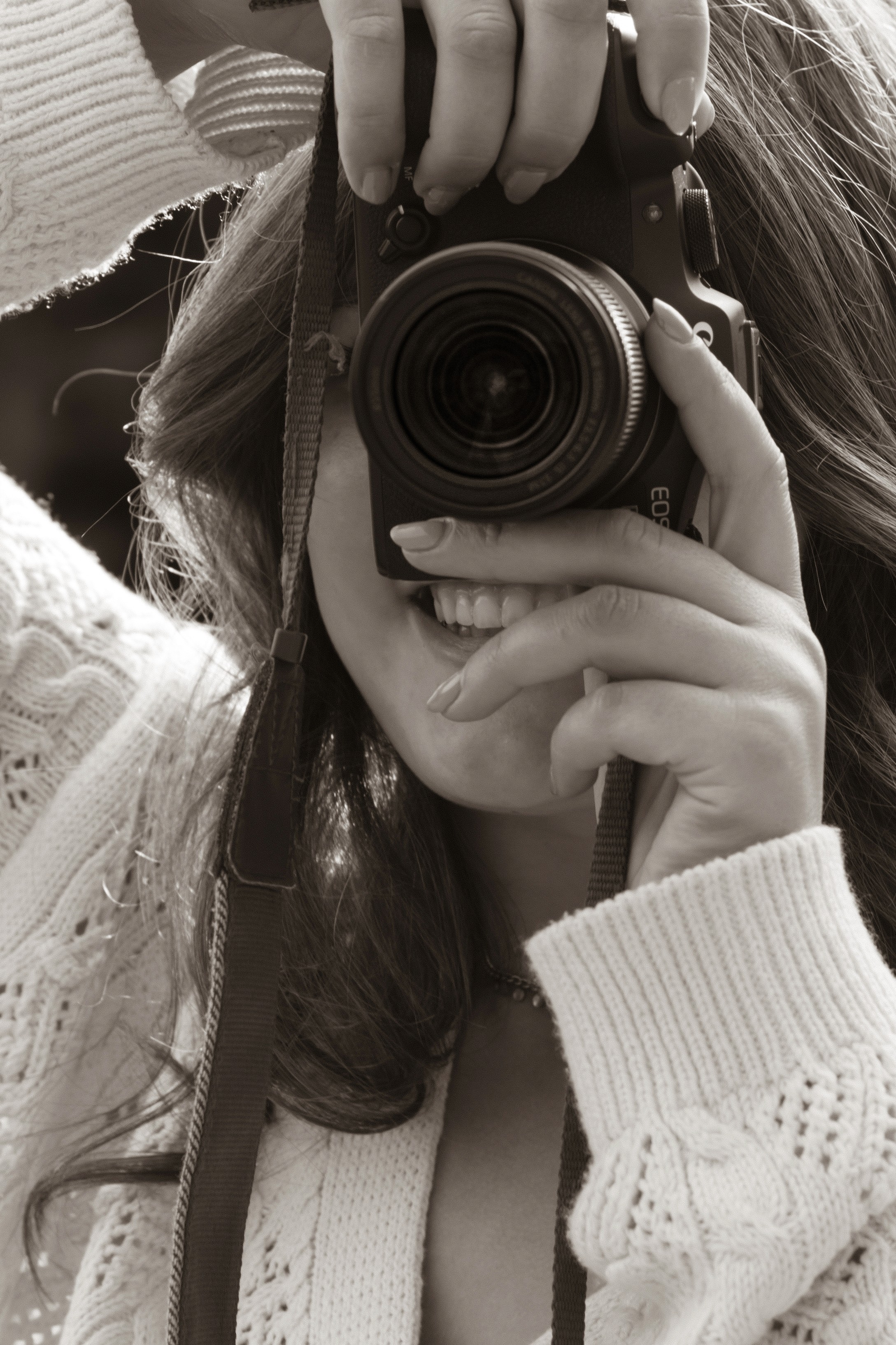 a blurry photo of a person standing in front of a wall