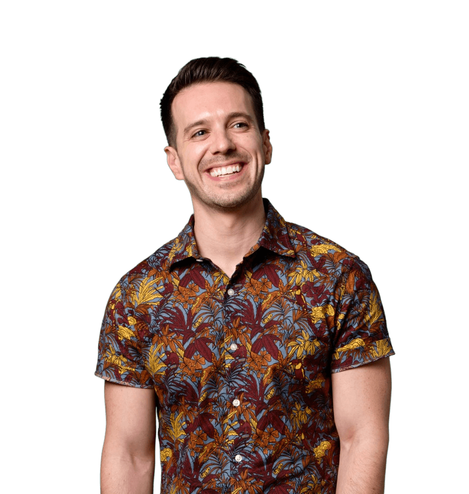 Adam Winograd smiling in front of a green background, representing his creative and friendly brand image