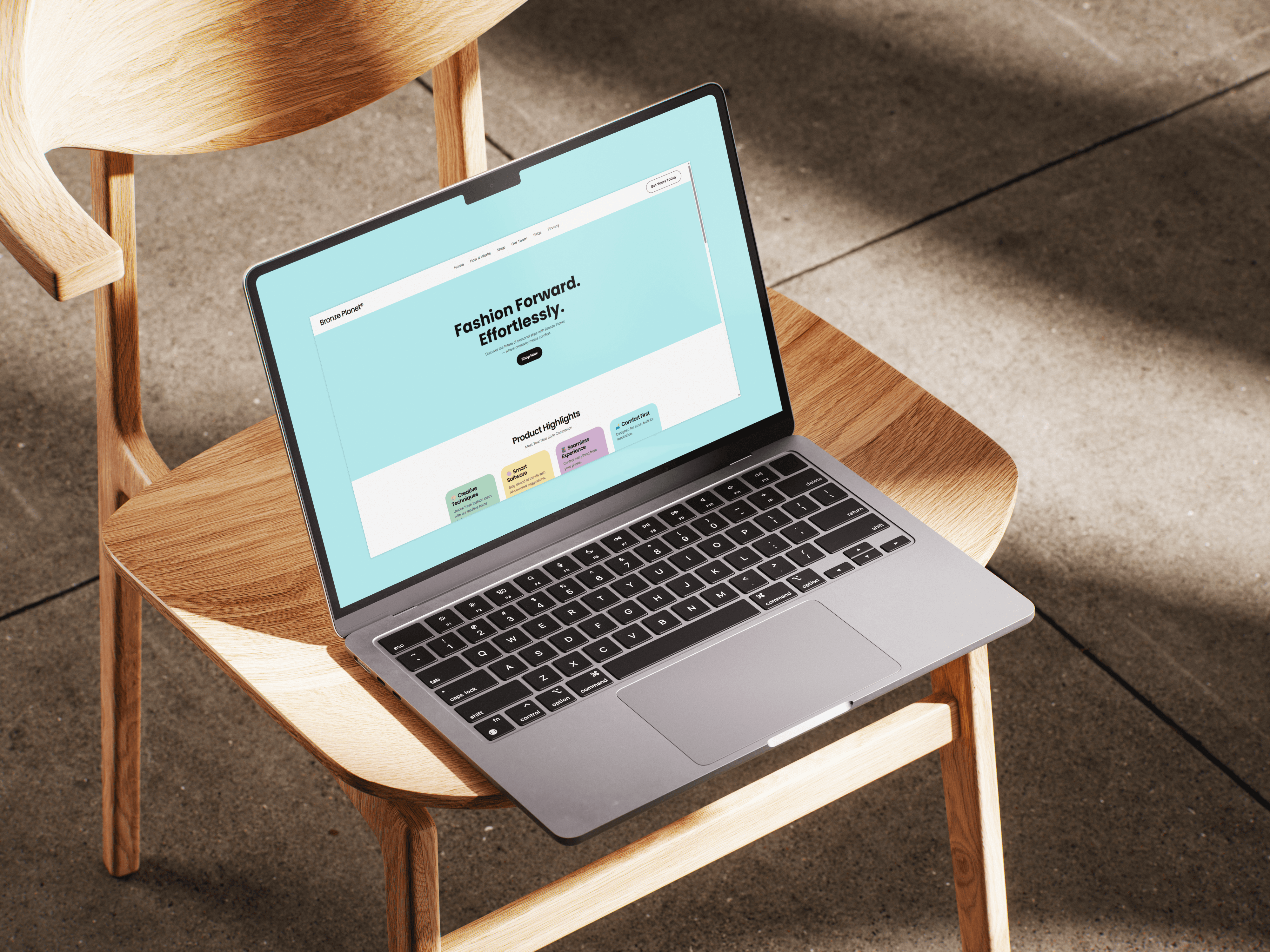A laptop displaying a website is open on a wooden chair with natural lighting.