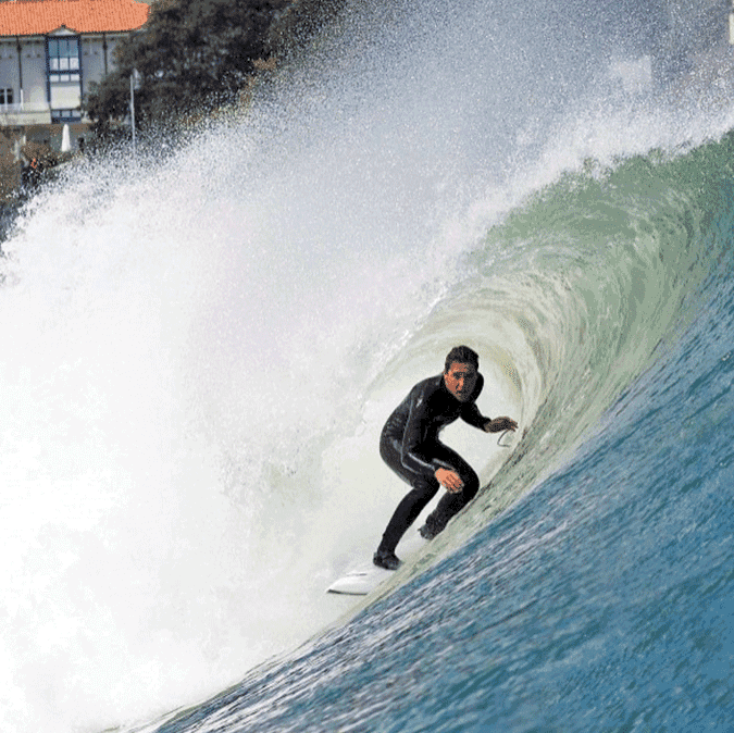 Man surfing on a large wave – surfboard rental in santa-cruz