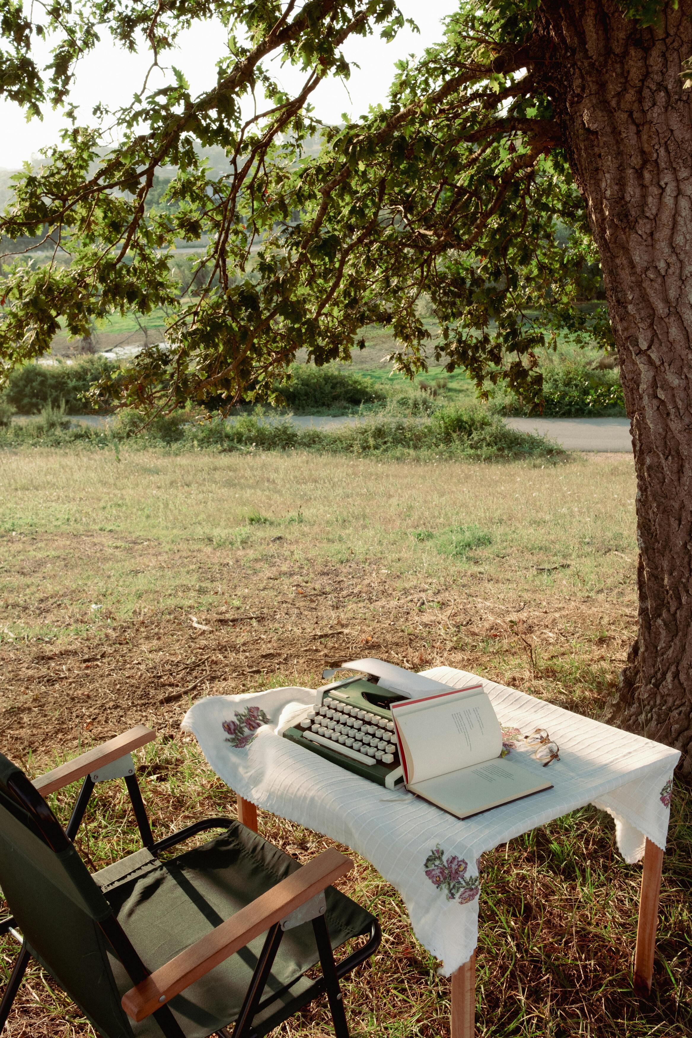wicker table and two chairs near swimming pool