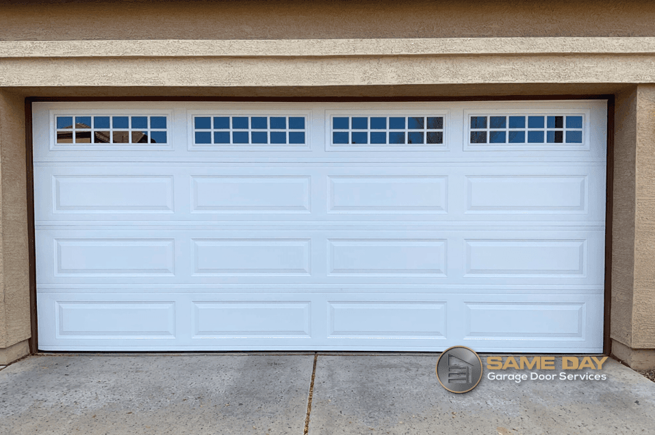 Homeowner checking if his garage door needs to be replace