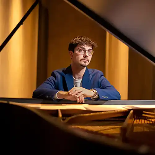 Caelan Cardello at the piano.