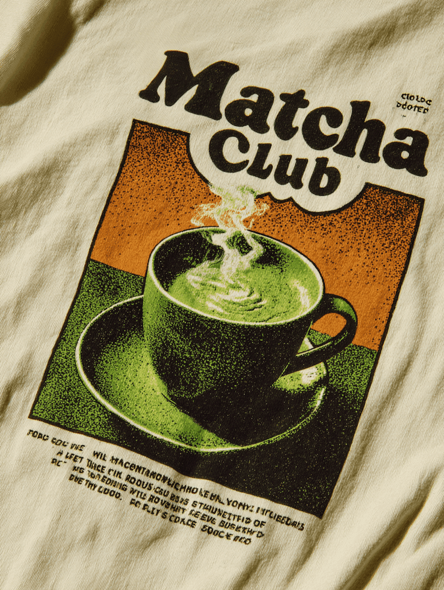 Back view of oversized t-shirt featuring Matcha Club graphic print with illustrated green tea cup design