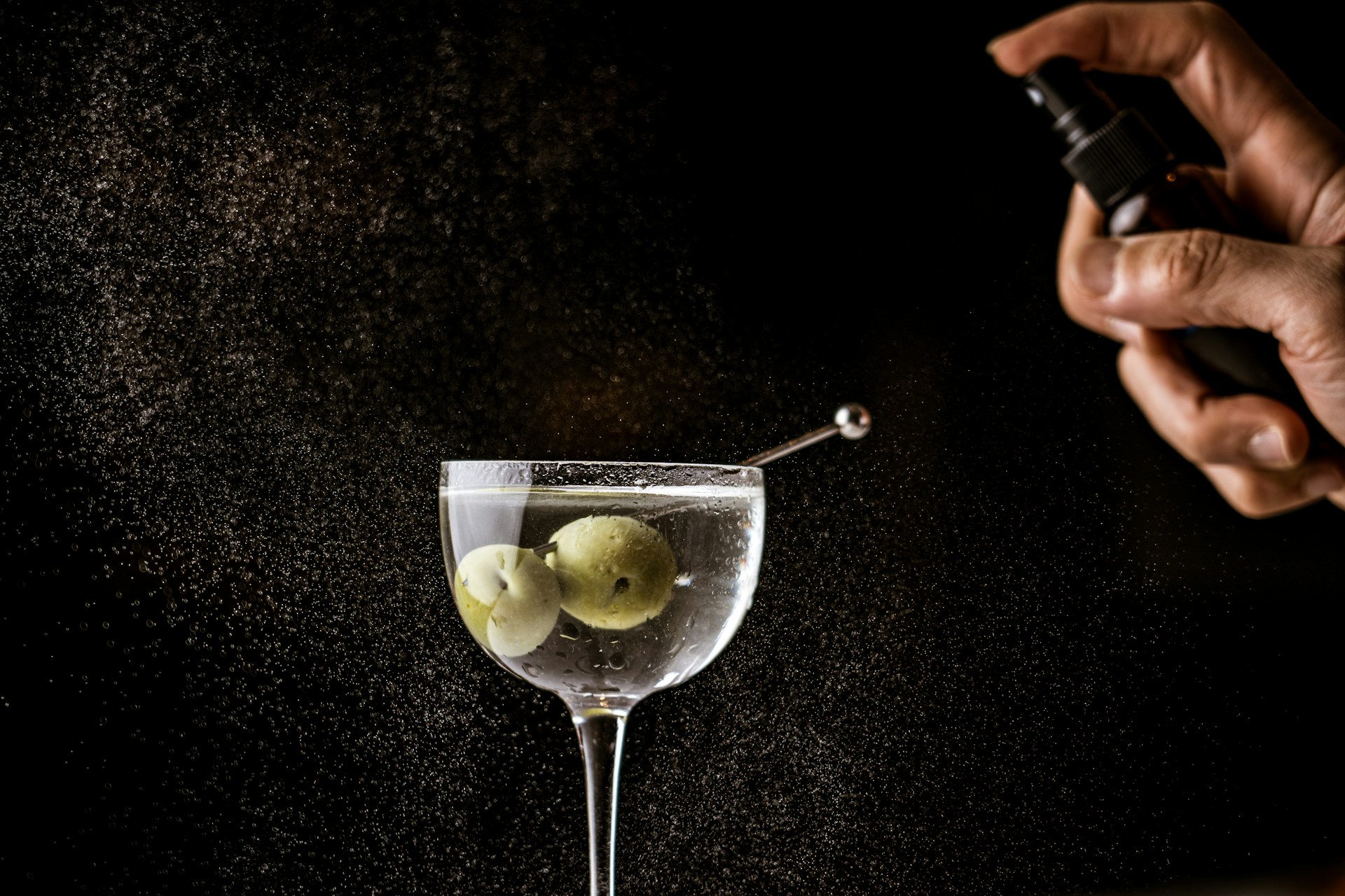 Martini being misted with saline tincture