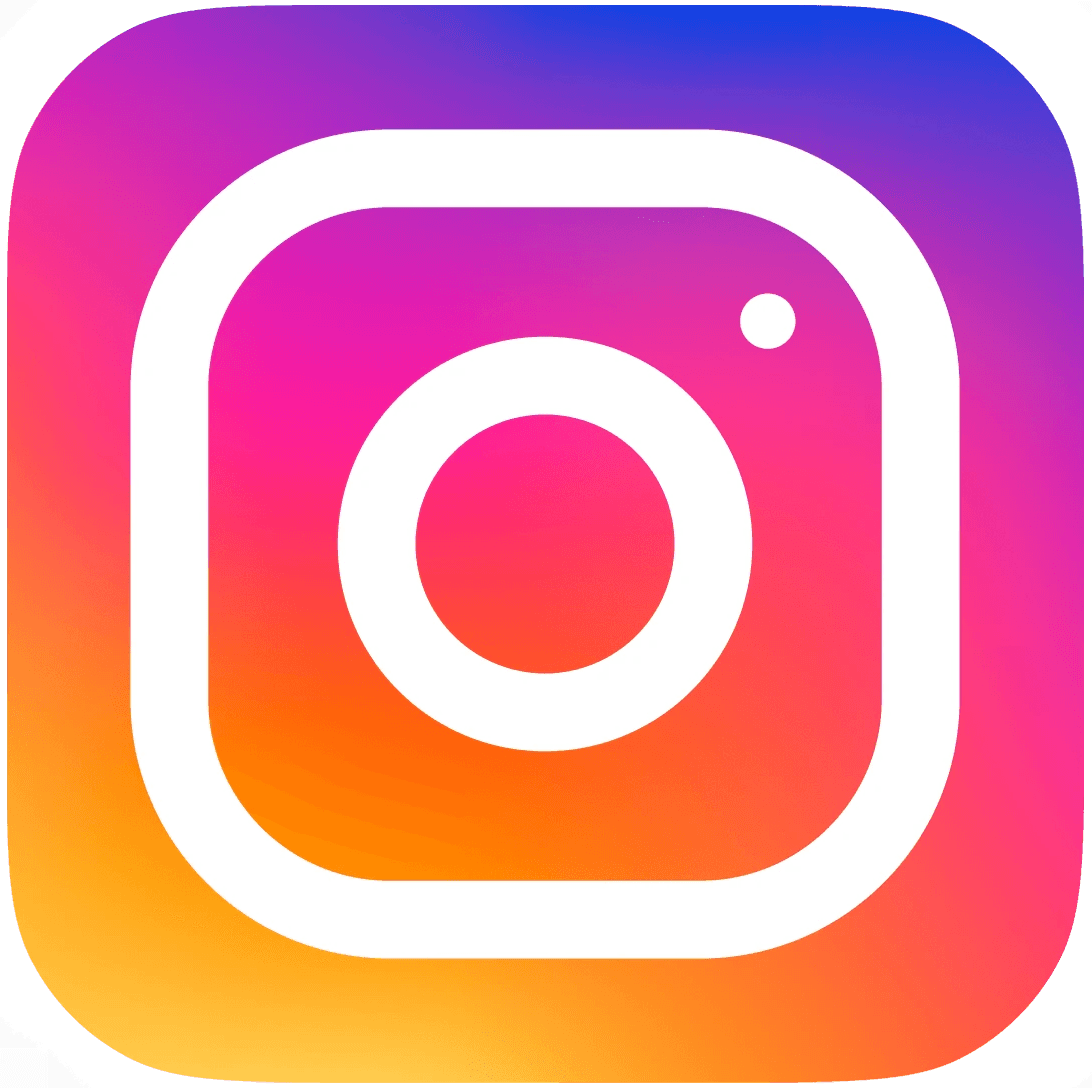 Instagram logo with colorful paint splatters and hearts