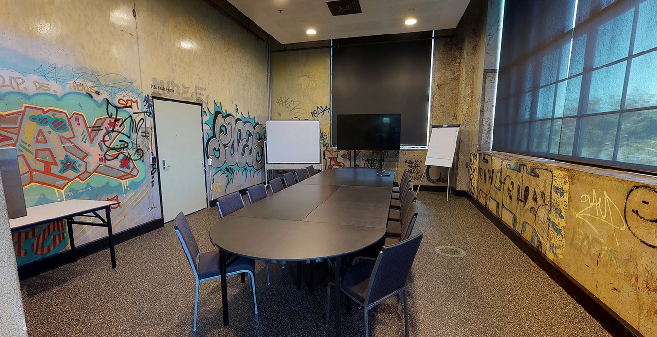 Boardroom meeting table set up in the Graffiti Room at the Brisbane Powerhouse