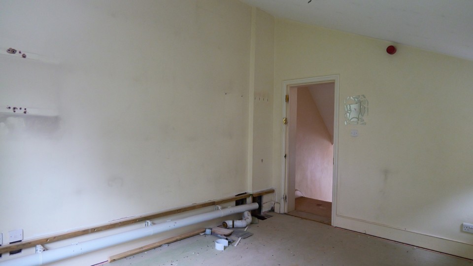 HMO room refurbishment showing pipework installation and preparation for new layout