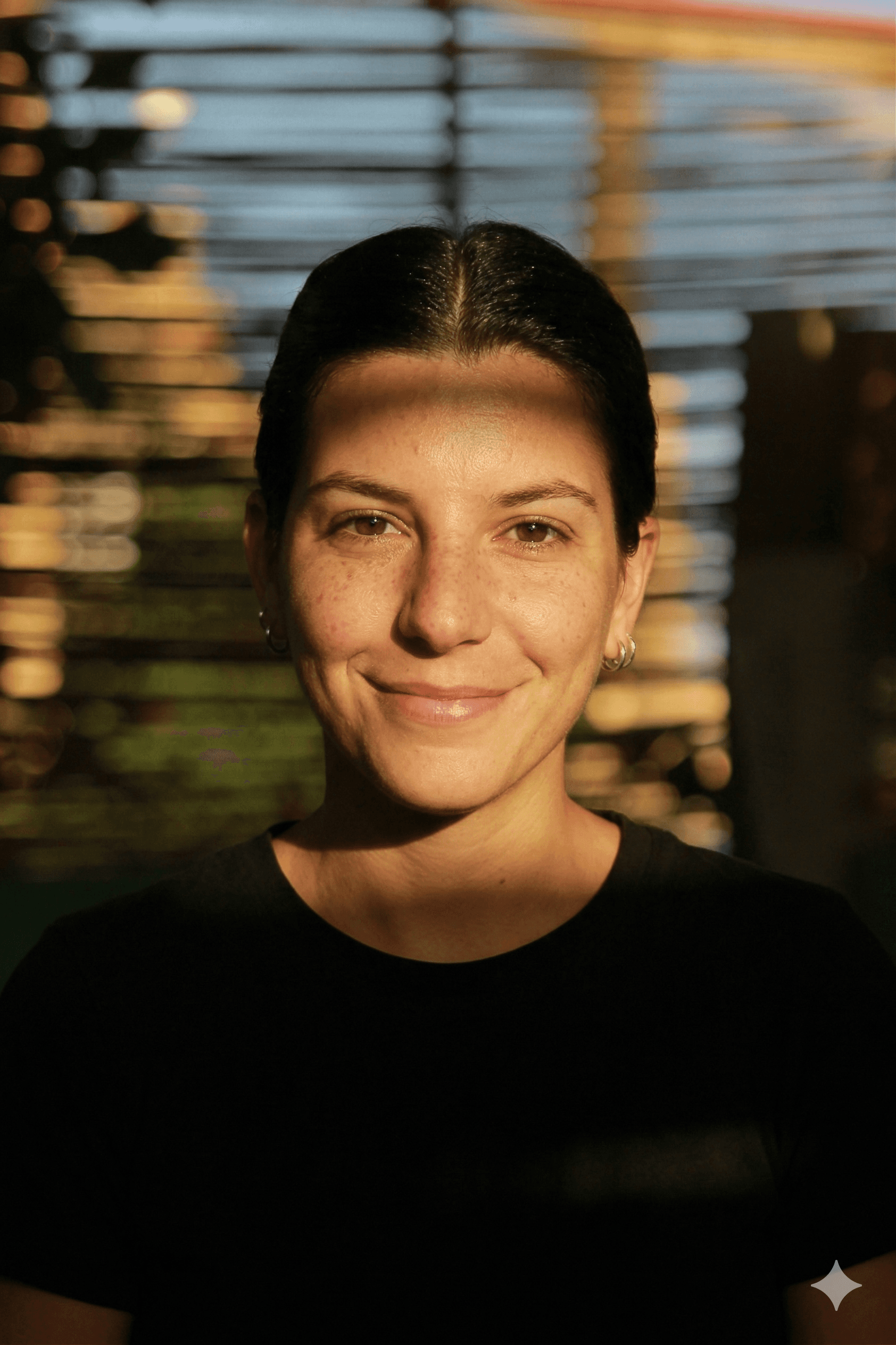 man in black crew neck shirt smiling