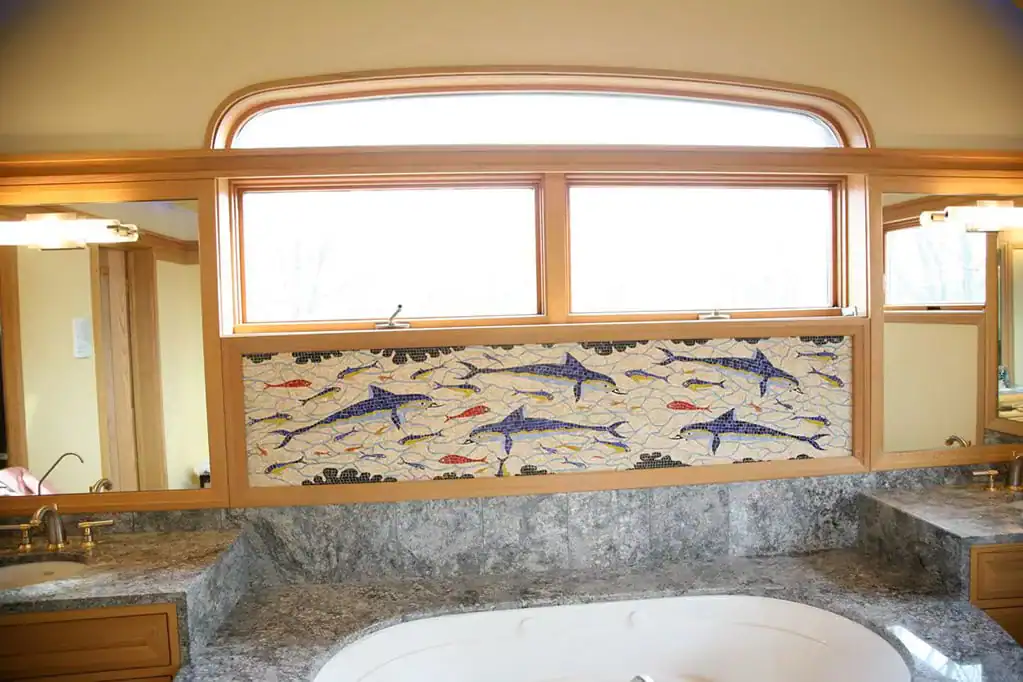 Ocean fish mosaic wall art for bathroom decor, featuring vibrant marine life in mosaic style.