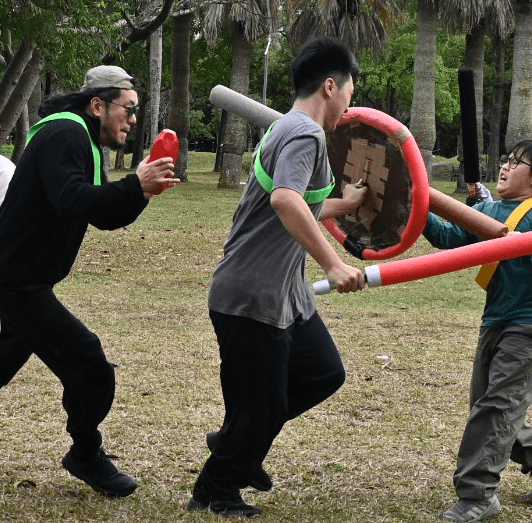 husband and wife working happily on a laptop