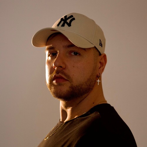 Portrait of a young man on a blue background
