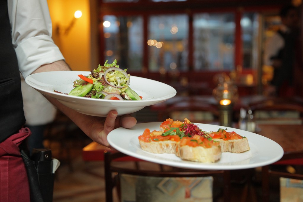 chef holding plates