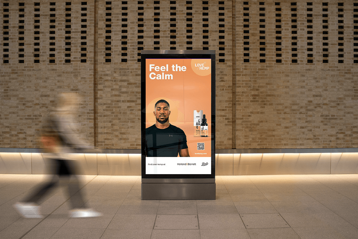 Streetside billboard with flyposters of the Batch.Works brand and illustrations