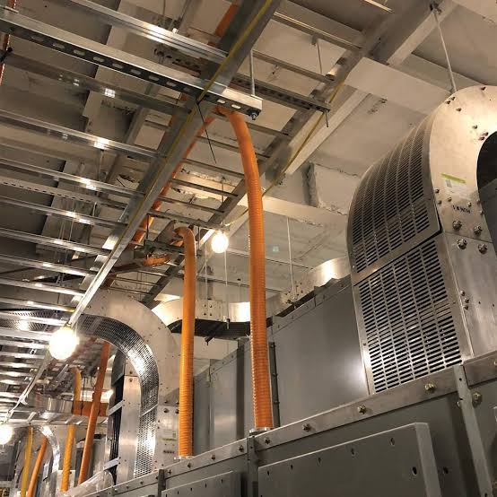 Power Bus Way overhead power distribution busway tracks for commercial and industrial buildings requiring continuous electrical access in BC