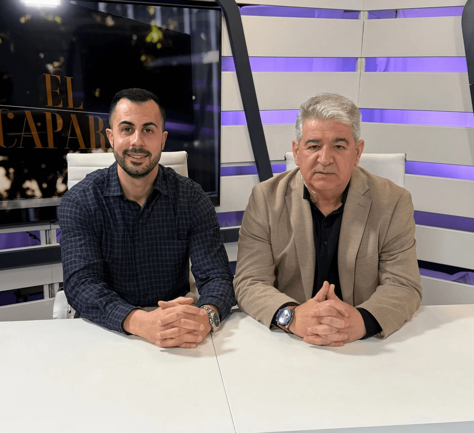 man in black shorts and black tank top doing push up