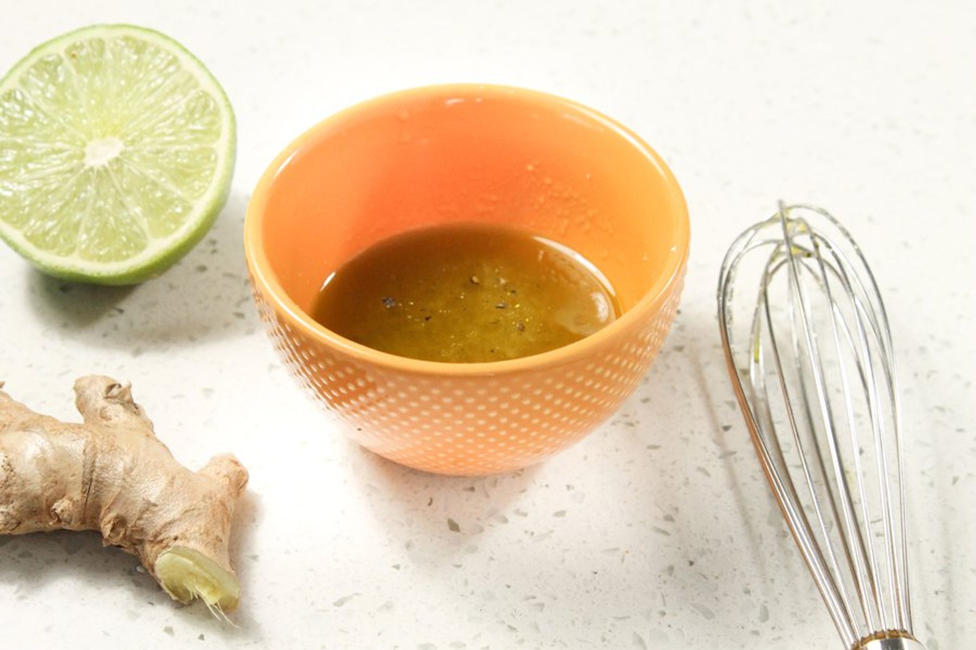 oil, ginger, and lime juice on the table