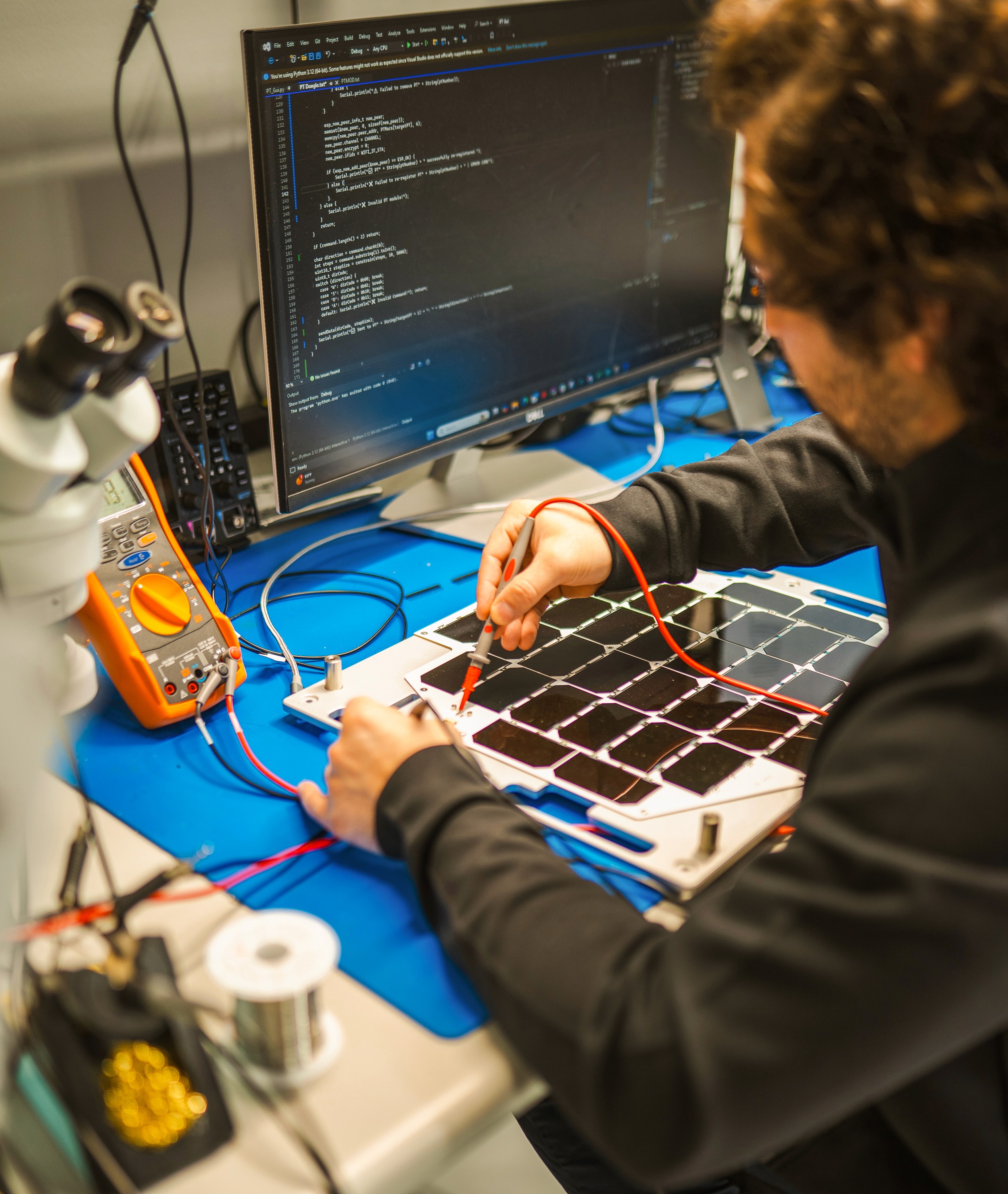 Star Catcher engineer working on solar panels