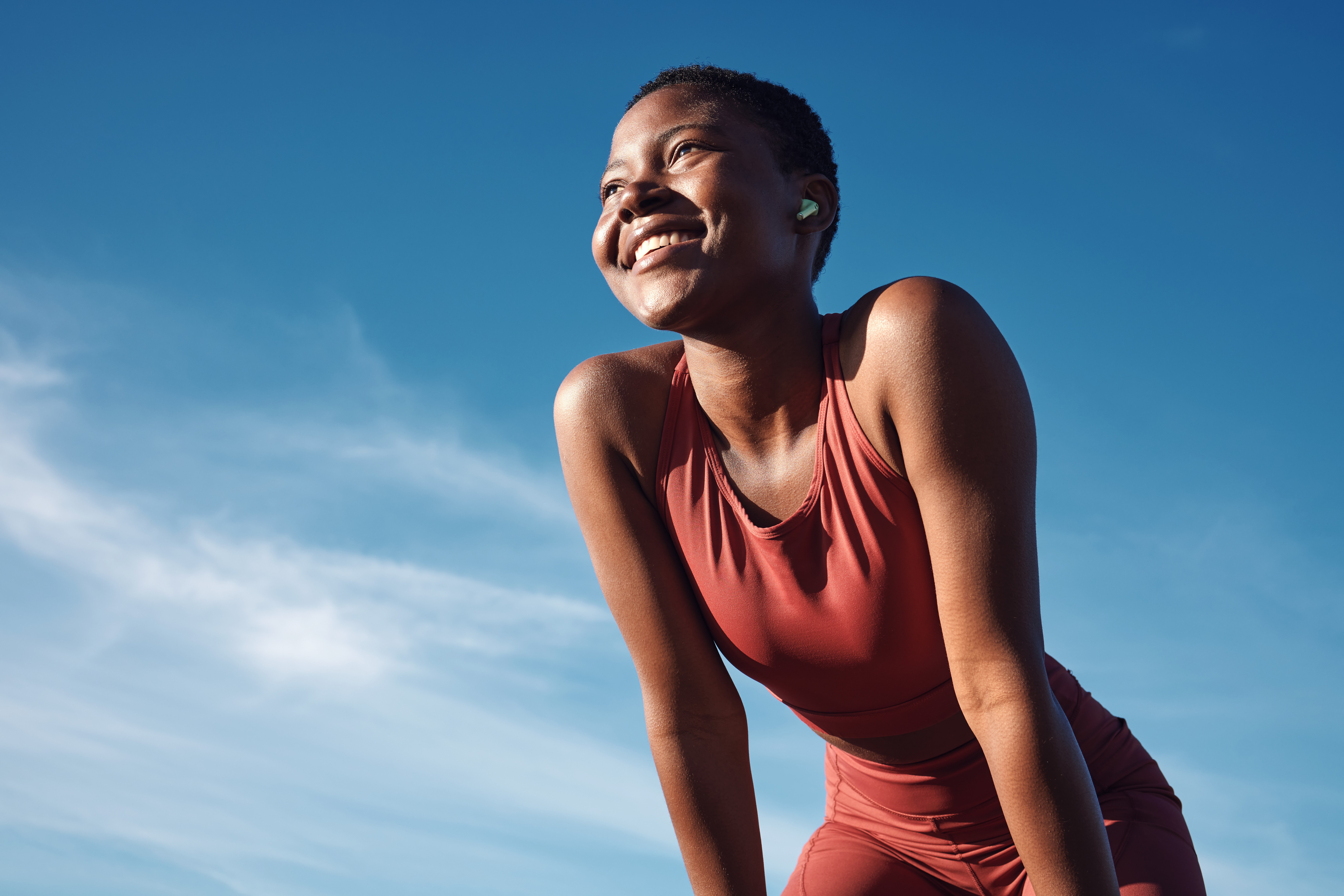 A woman of color doing yoga