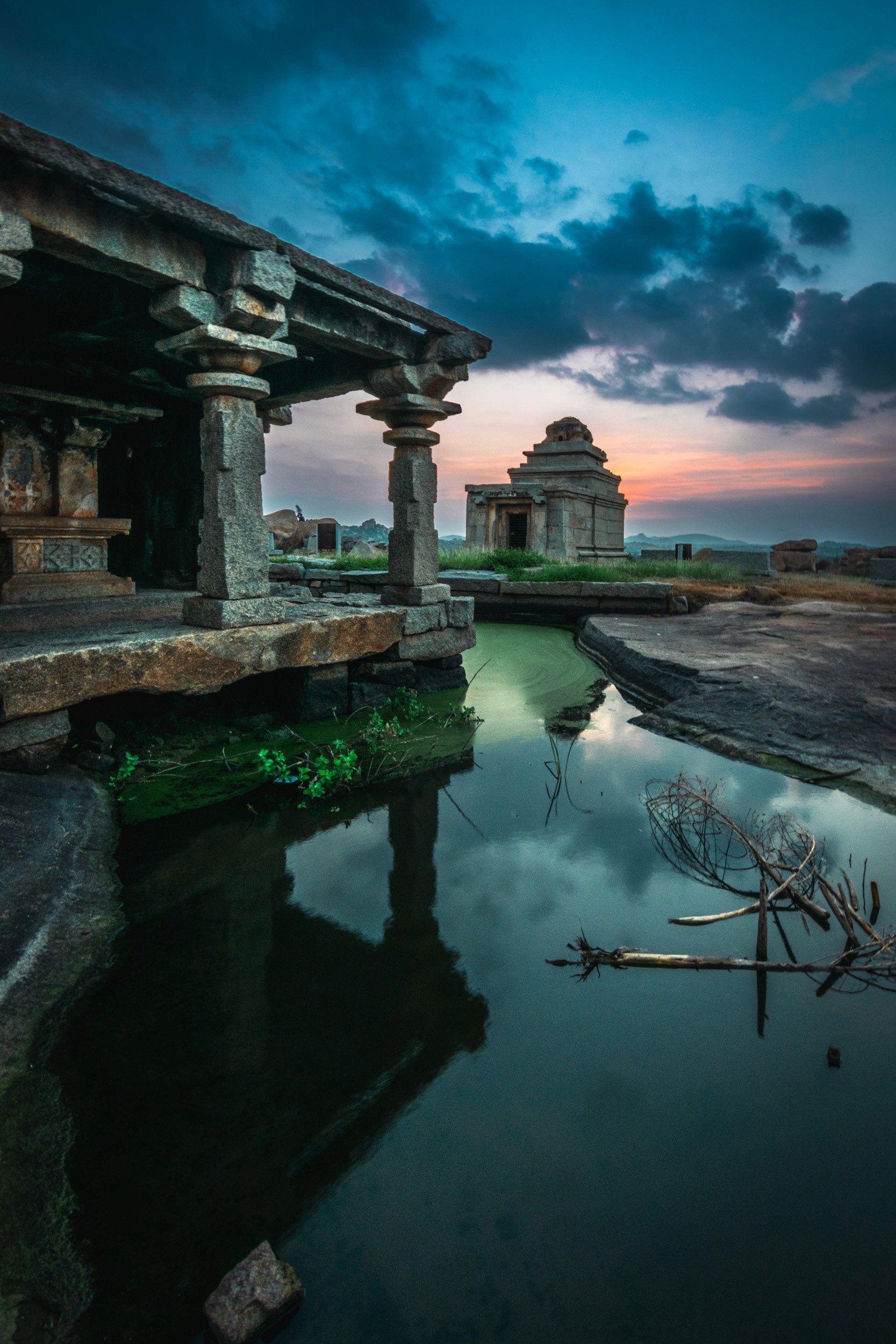 The Mirror of Time — A reflection of the divine in the twilight waters of Hampi.