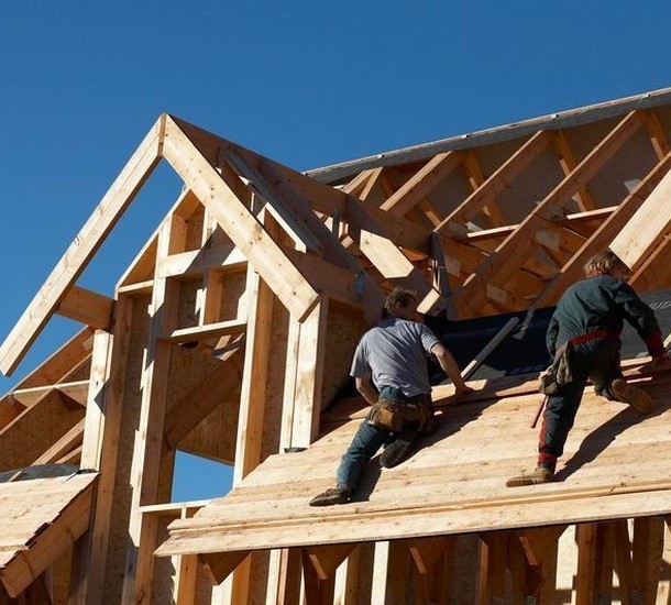 person sitting on chair using Surface