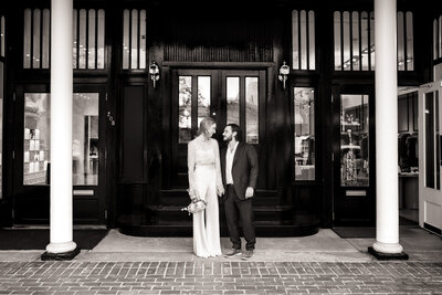 Candid moment of a wedding couple photographed downtown