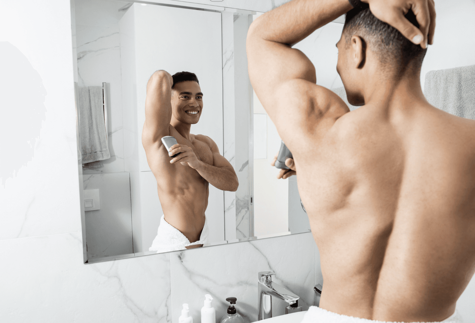 Man applying antiperspirant