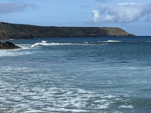 blue sky and white clouds over the sea