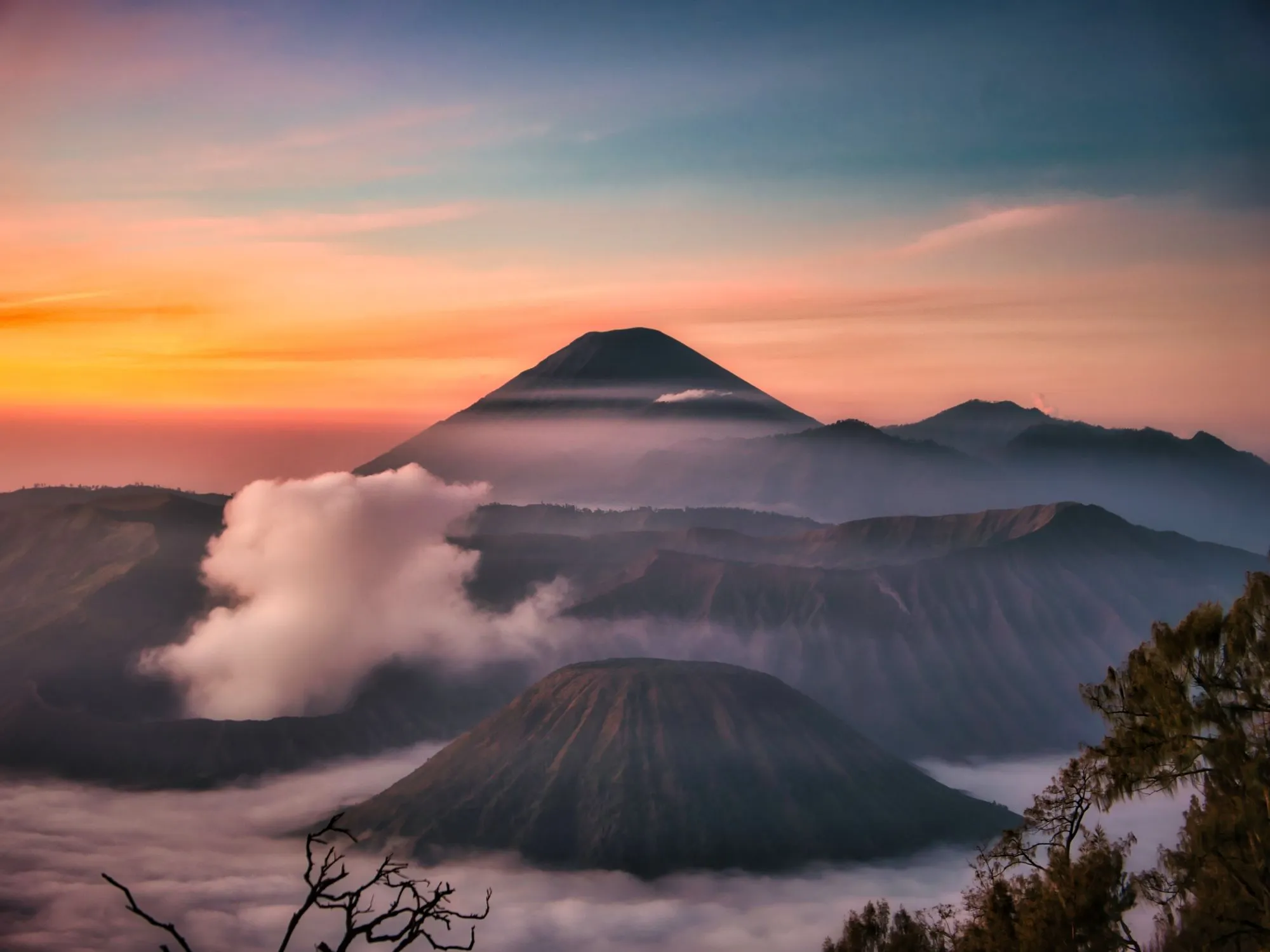 Clouds over volcanoes of Bromo Tengger Semeru National Park, East Java