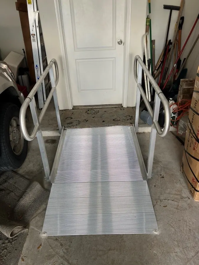 Modular aluminum ramp at a front door