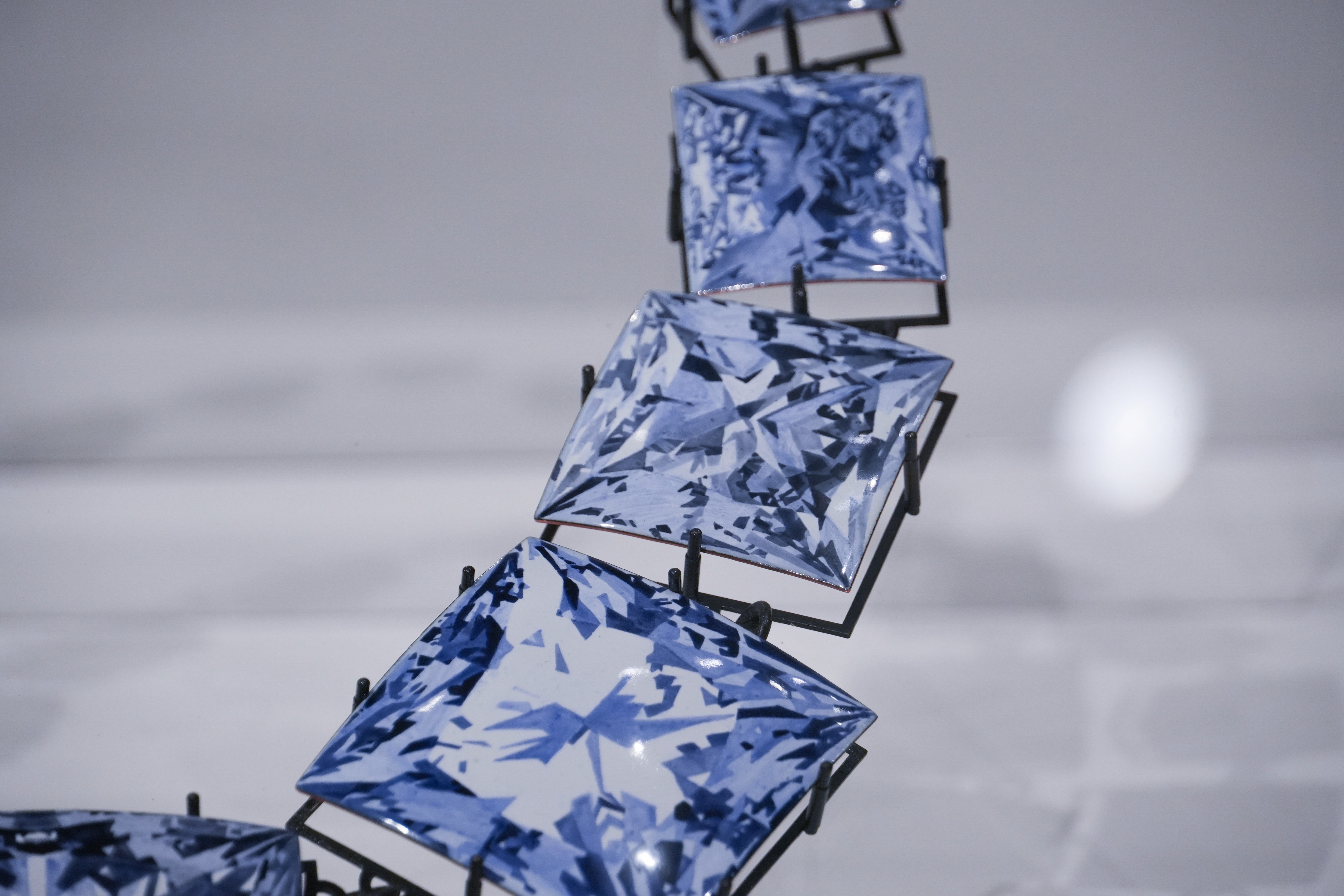 Close up of Gem by Yuxin Song, painted enamel on copper, contemporary jewelry necklace, selected for SCHMUCK 2026 Munich