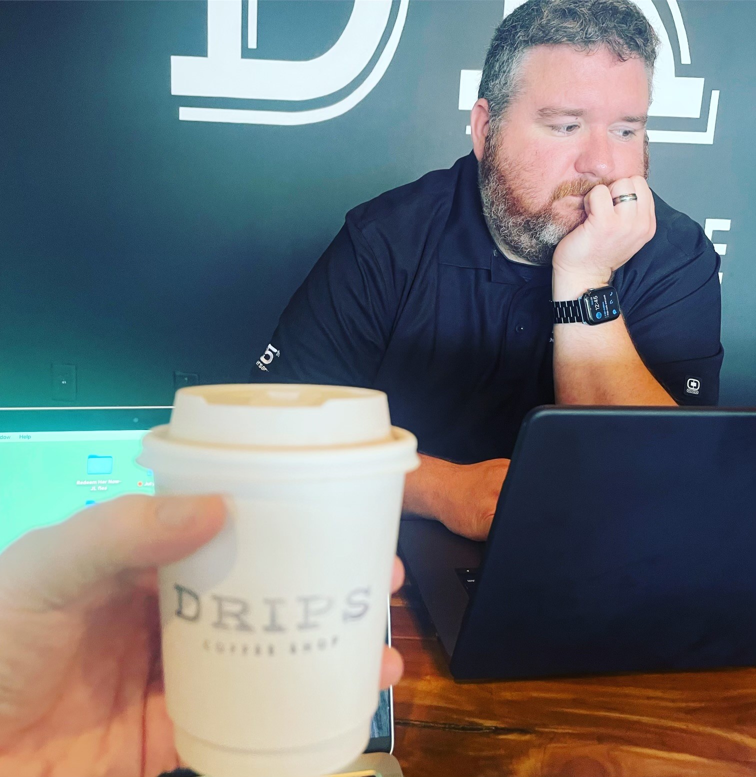 Music producer sitting on a chair in his studio
