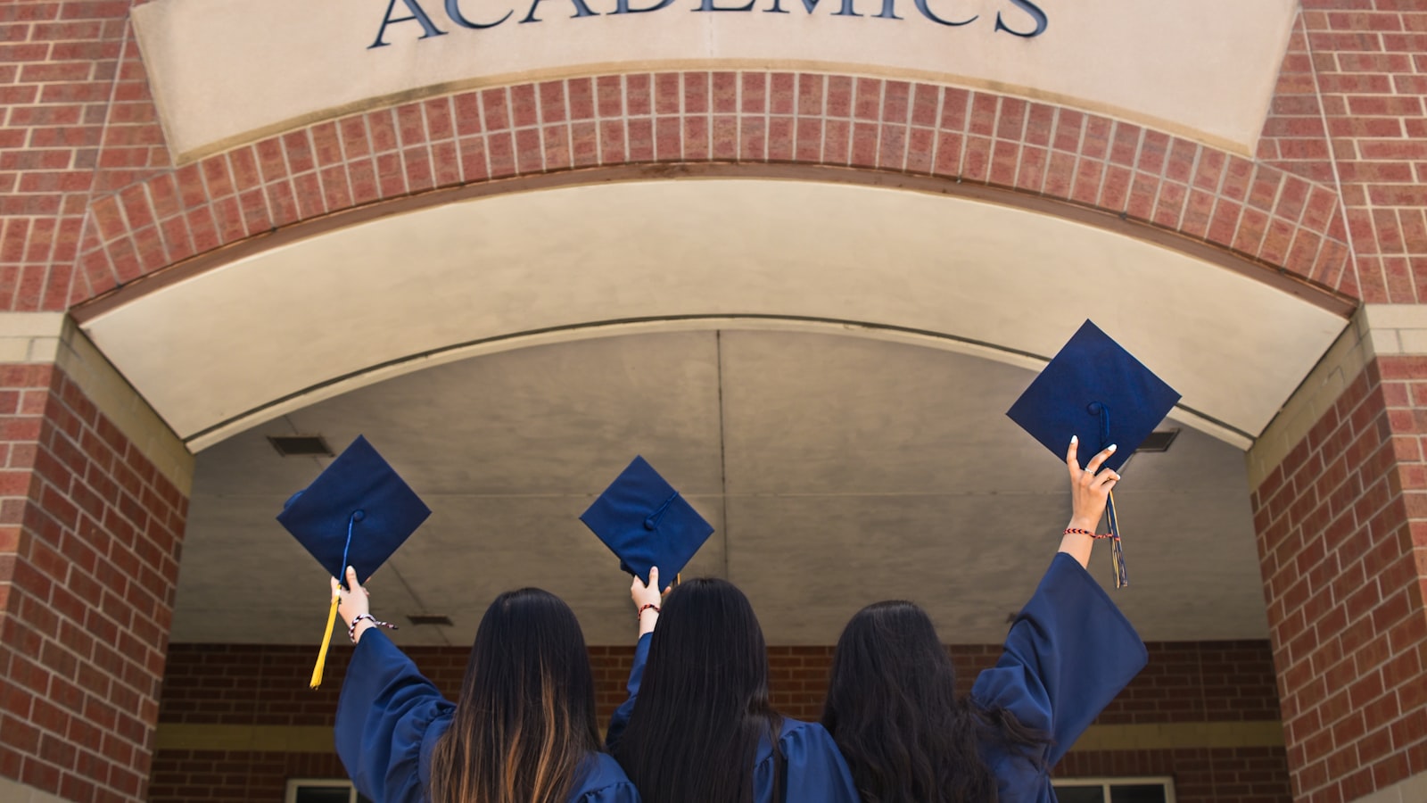 Graduates celebrating together after their degree ceremony