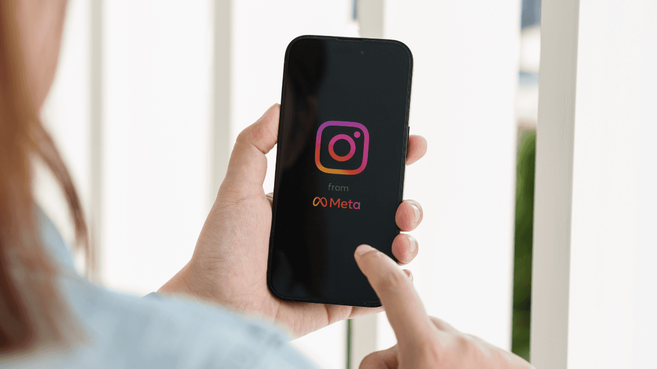 Person posting at the best time on Instagram.