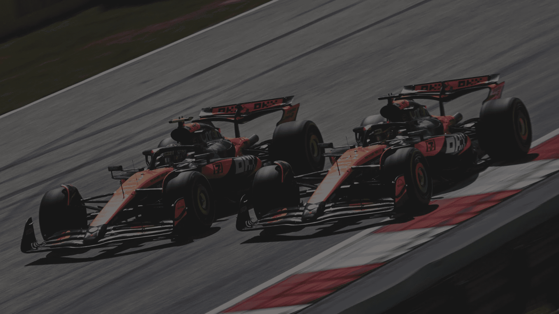 A large christmas tree in front of a tall building
