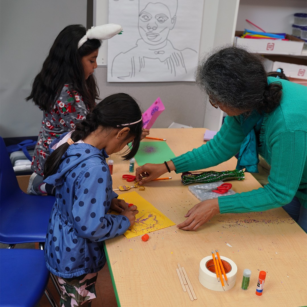 Children exploring arts and crafts during a creative aftercare activity led by a HOKALI educator.