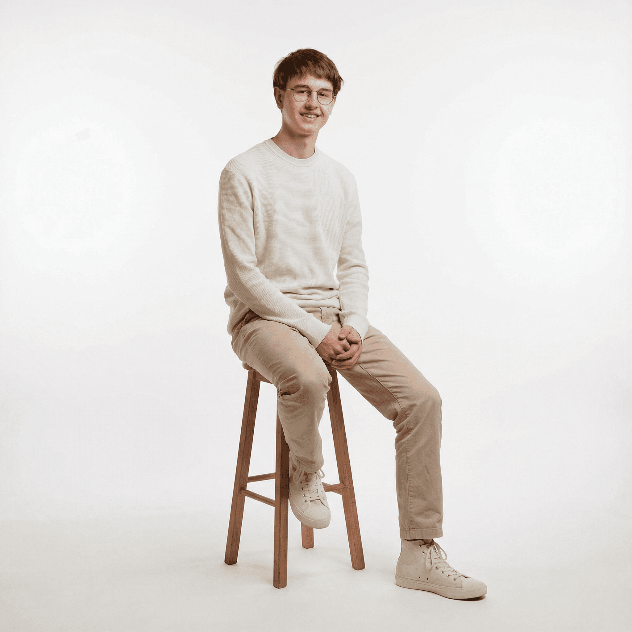 Portrait von Webdesigner Liivo Bätschmann auf dem Stuhl