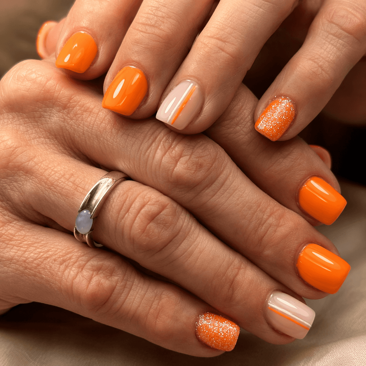 Pose orange réalisée chez Bel’unghia