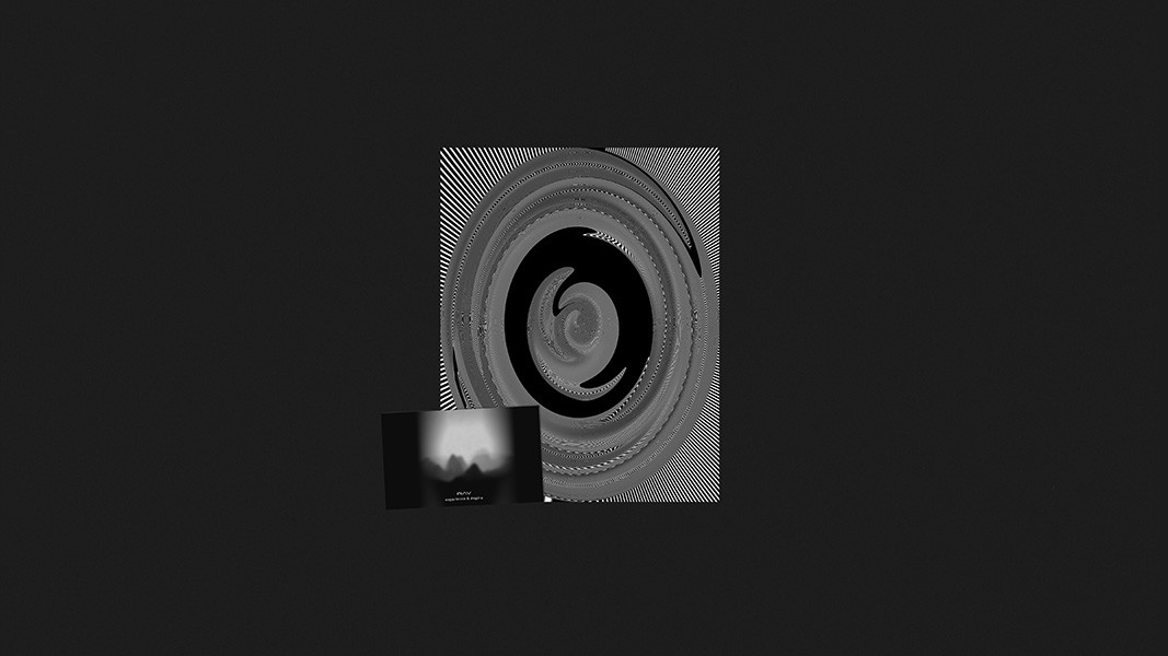 A grayscale image displays a large, circular, spiral design with a black center and concentric rings, set against a dark background. Below it, a smaller, rectangular image shows a grayscale scene with a light source and a darkened landscape. The overall composition is monochromatic, with varying shades of gray.
