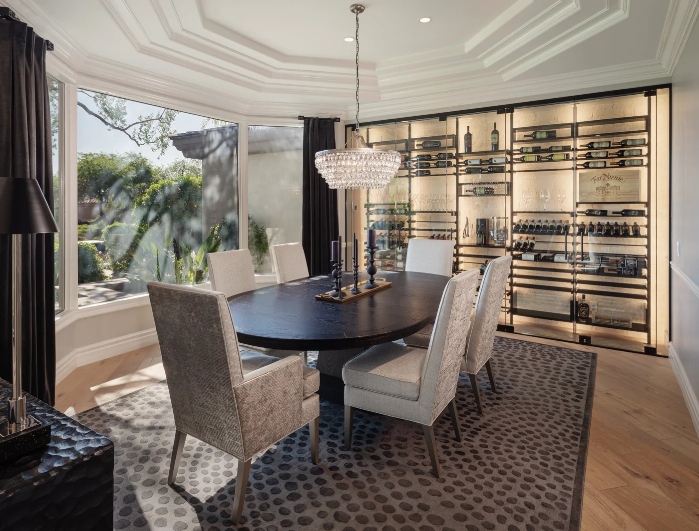 nfinity pool blending into the ocean view, minimalist sun loungers in soft neutral fabric, curved architecture