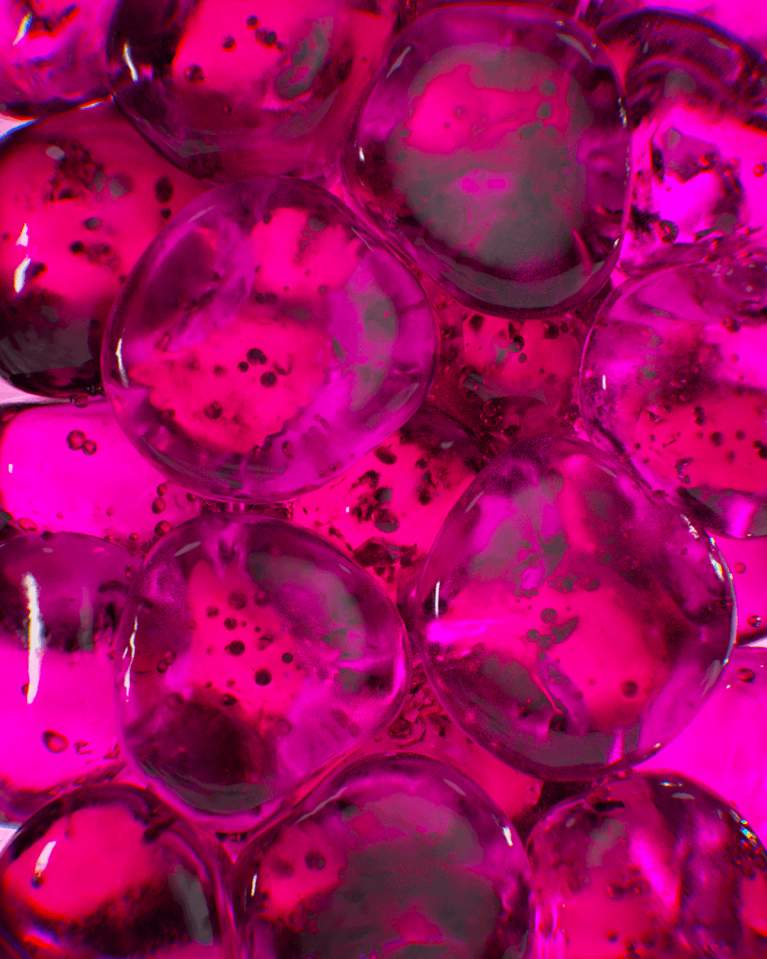 Young male tennis player mid-swing on an outdoor court, aerial view with motion blur on racket and ball
