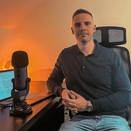 man wearing Lacoste zip-up hooded top