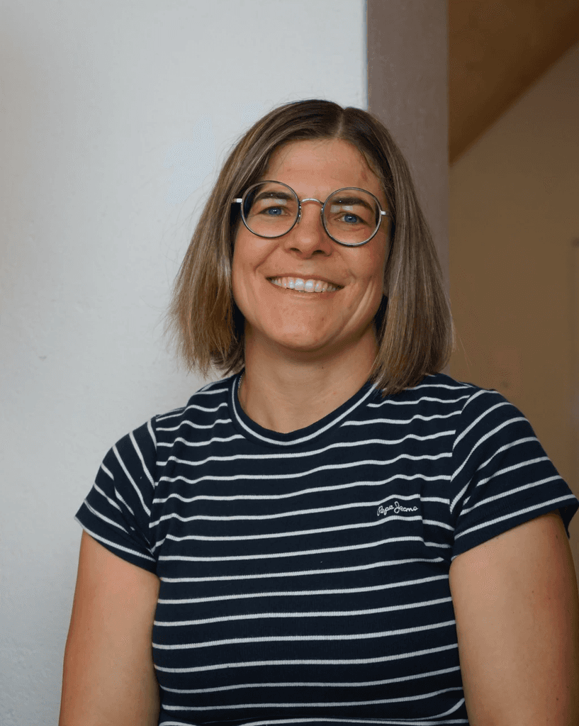 Massage therapist massaging a person's back