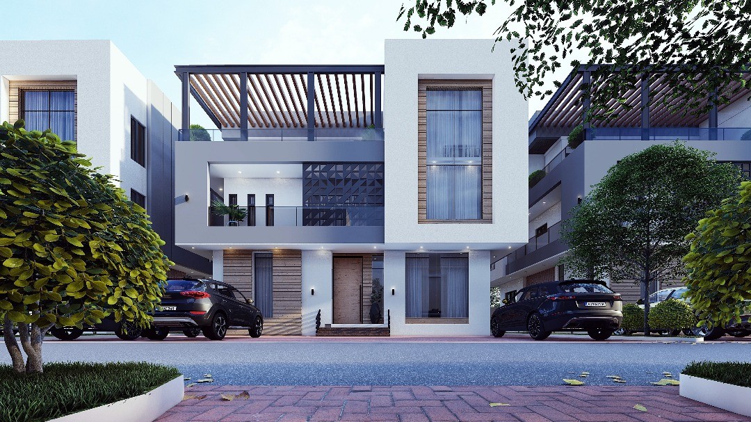 Modern house with a green and white facade, large windows, and a wooden entrance. Surrounded by lush plants and palm trees under a clear blue sky.