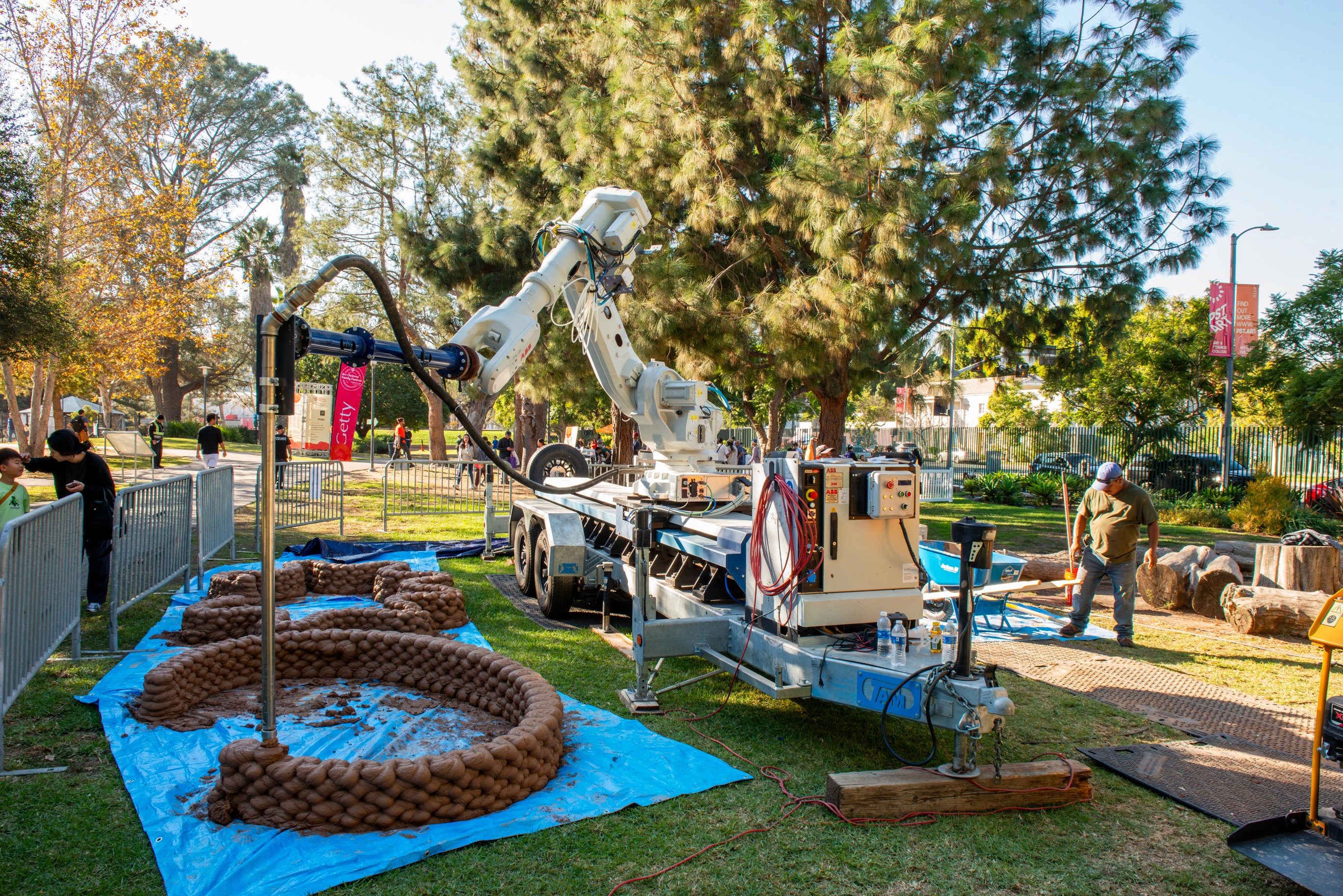Children engaging in hands-on activities at an educational festival booth.